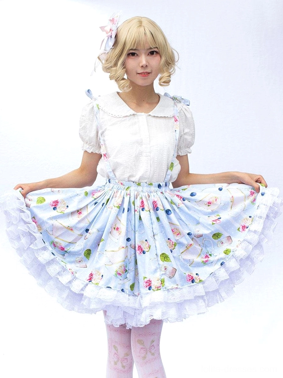 Sweet lolita skirt set full flared floral printed skirt white ruffle hem patterned thigh highs front lifted view white background