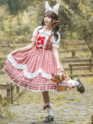 Sweet lolita dress side profile dynamic pose showing flared skirt hem and red bow ankle socks outdoor picnic setting