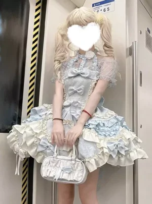 Sweet lolita halter dress close-up detail sheer short sleeves bowknot decoration on bodice light blue with ivory ruffles