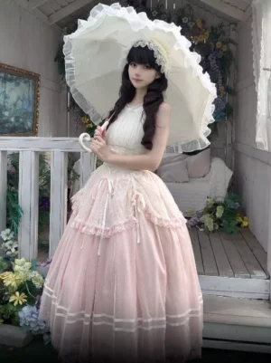 Pink halter lolita dress side three-quarter angle model holding vintage lace parasol corset bodice ruffled tiered skirt romantic balcony scene