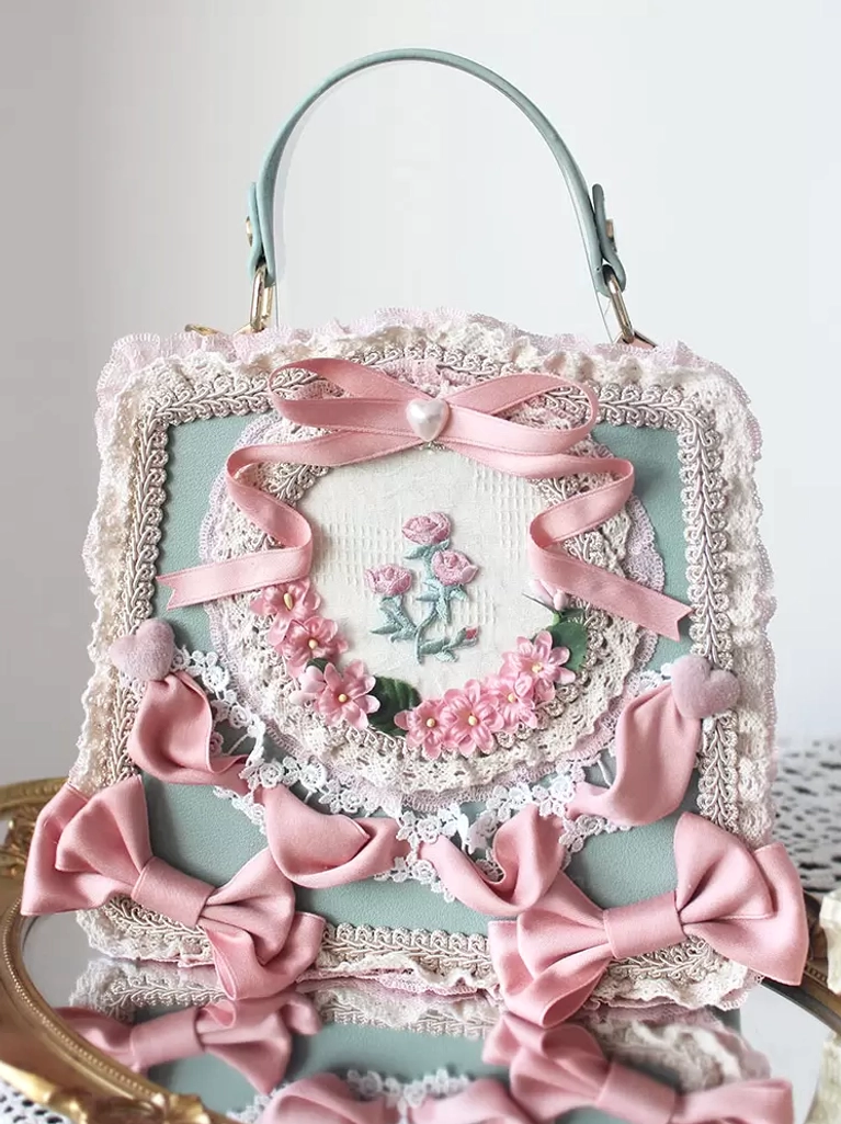 Mint green sweet lolita PU leather handbag with pink satin bows and floral embroidery on golden tray