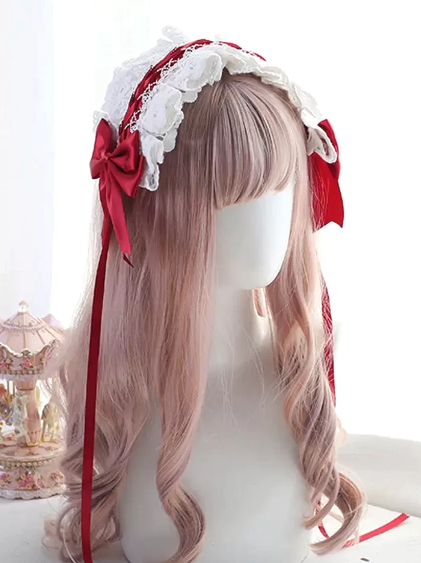 Romantic Sweet Lolita lace headband with white lace and wine red satin bow featuring long trailing ribbons, displayed on mannequin with pink wavy hair against vintage carousel decor, three-quarter side view