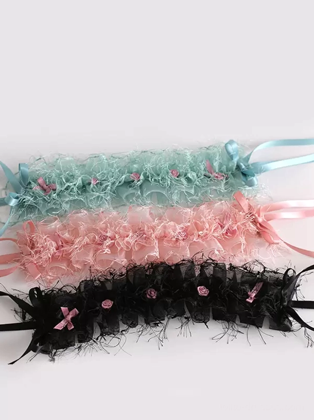 Three-piece sweet lolita headdress set in flat lay view showing black, mint green, and light pink color options with matching ruffled frayed design, small pink flower details, and ribbon ties