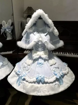 sweet lolita hooded cape dress set blue white fuzzy fur trim snowflake bows front view on dress form piano backdrop