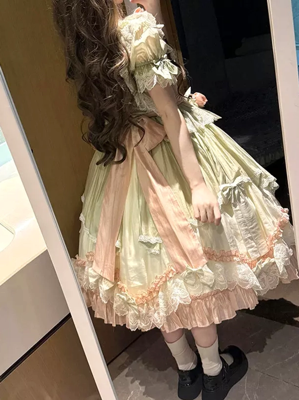 Lolita JSK dress back view with oversized peach satin bow lace-trimmed hem sweet cottagecore style
