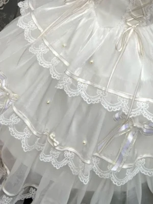 close-up detail lace layers satin ribbons pearl embellishments lace-up bows white sweet lolita jumper skirt lace trim