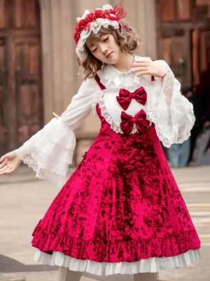 Sweet lolita jumper dress with white lace bell sleeves layered ruffled skirt hem three-quarter side view with flower headdress