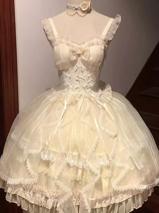 Ecru white beige sweet lolita JSK dress with embroidered chest bow, structured corset waist, ruffled lace hem, and voluminous tulle layers on display form