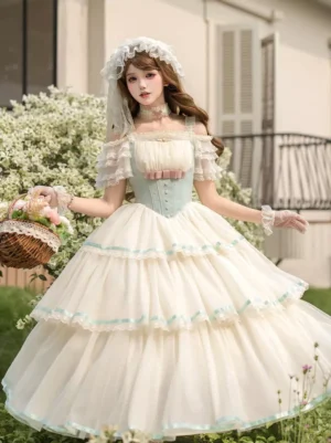 Sweet lolita pinafore gown with cold-shoulder ruffled sleeves, mint corset waist detail, full tiered skirt worn by model with flower basket
