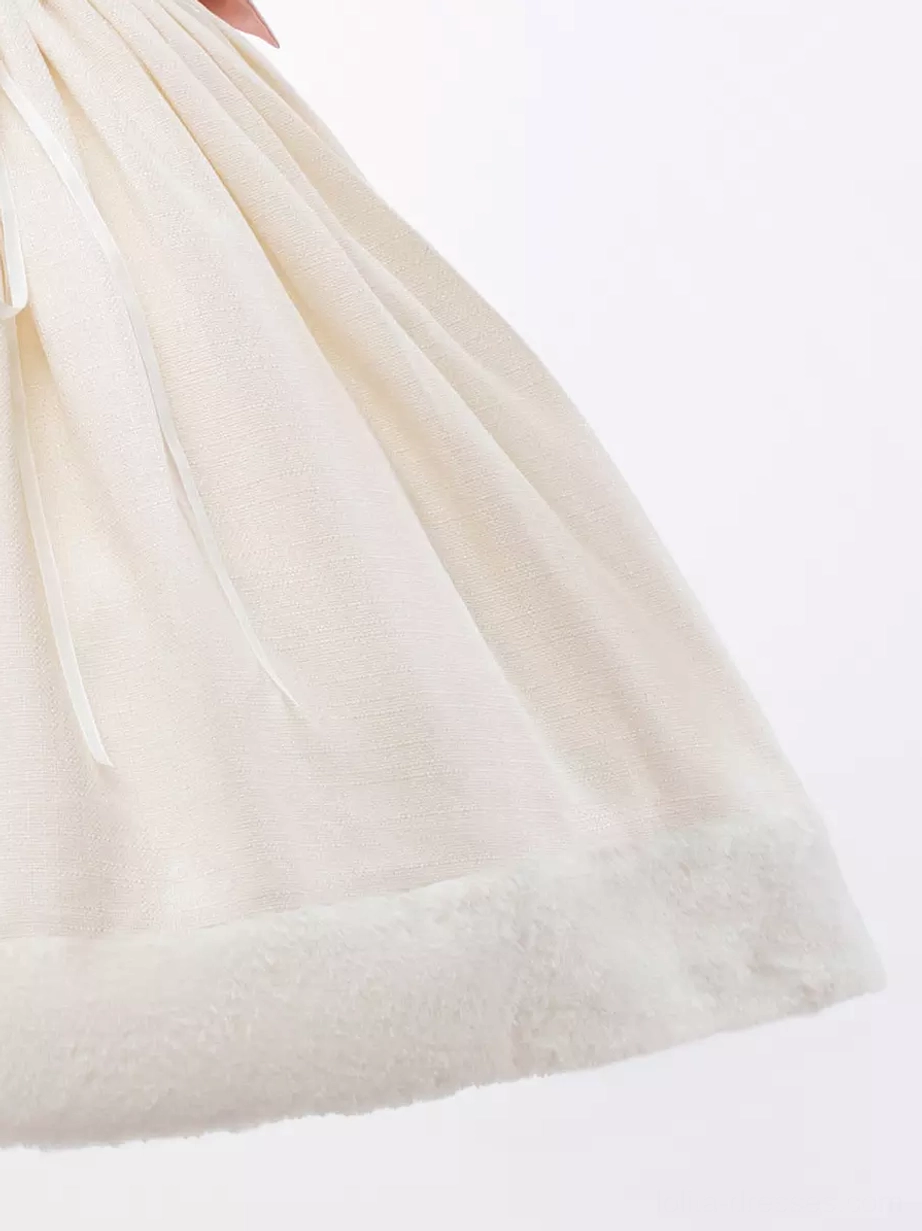 Sweet Lolita JSK dress hem detail pleated skirt fuzzy fur trim fluffy texture cream woven fabric close-up