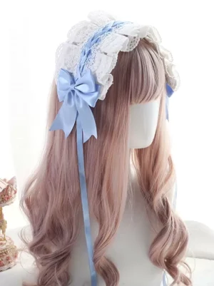 Sweet Lolita lace headband with white ruffled lace and sky blue satin bow featuring long trailing ribbons, styled on mannequin with pink wavy hair and vintage decor background, showing three-quarter side angle view