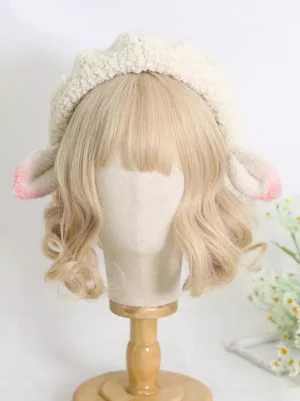 Handmade Lolita lamb ear beret with symmetrical pink-tipped ears front center view off-white sherpa material on mannequin