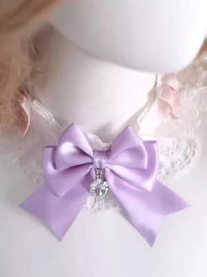 Sweet lolita lavender and white lace bow choker with heart-shaped crystal pendant and pink bow accents displayed on mannequin front close-up view