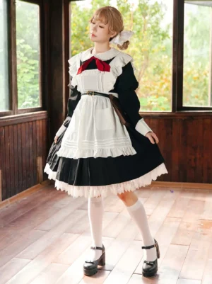 Sweet lolita maid apron full-body front view worn by cosplayer indoors with wooden window room setting white stockings and bow tie