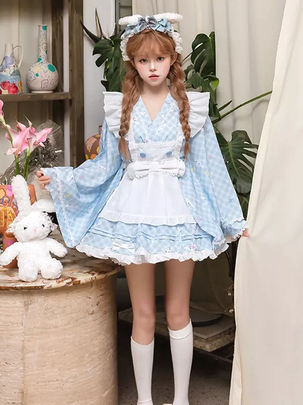 Front full view of light blue check lolita dress on model with double braids front bow apron tiny floral fabric prints and complete coordinate with accessories