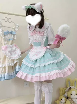 Pink blue sweet lolita maid dress with embroidered apron model wearing cat ear headband holding cotton candy