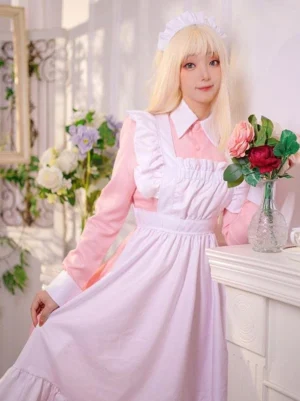 Sweet lolita maid dress three-quarter angle view showing ruffled floor-length apron and flared skirt hem