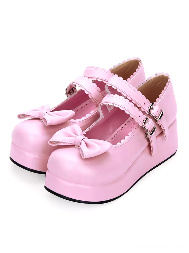Sweet Lolita Mary Jane platform shoes pastel pink PU leather three-quarter view double buckled straps romantic bow