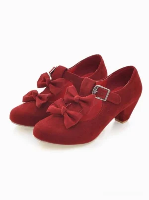 Sweet lolita Mary Jane pumps with double front bows and ankle buckle strap, front oblique view on white background