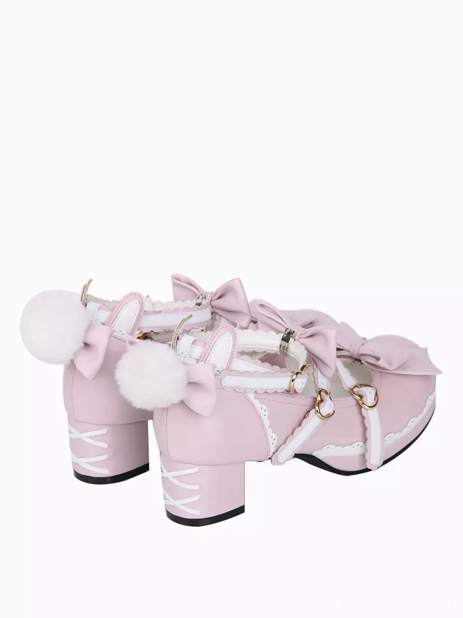 sweet lolita shoes rear three quarter angle lace up heel pom pom accents bow adorned straps