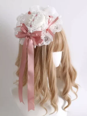 sweet lolita mini top hat hair clip rear left side view pink white lace bow pearl accents on mannequin