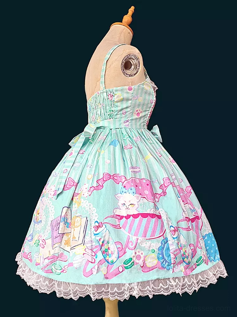 Sweet lolita sleeveless dress in mint green pastel shade with front bow embellishment, matching lace hem ruffle, and coordinating carousel candy print design