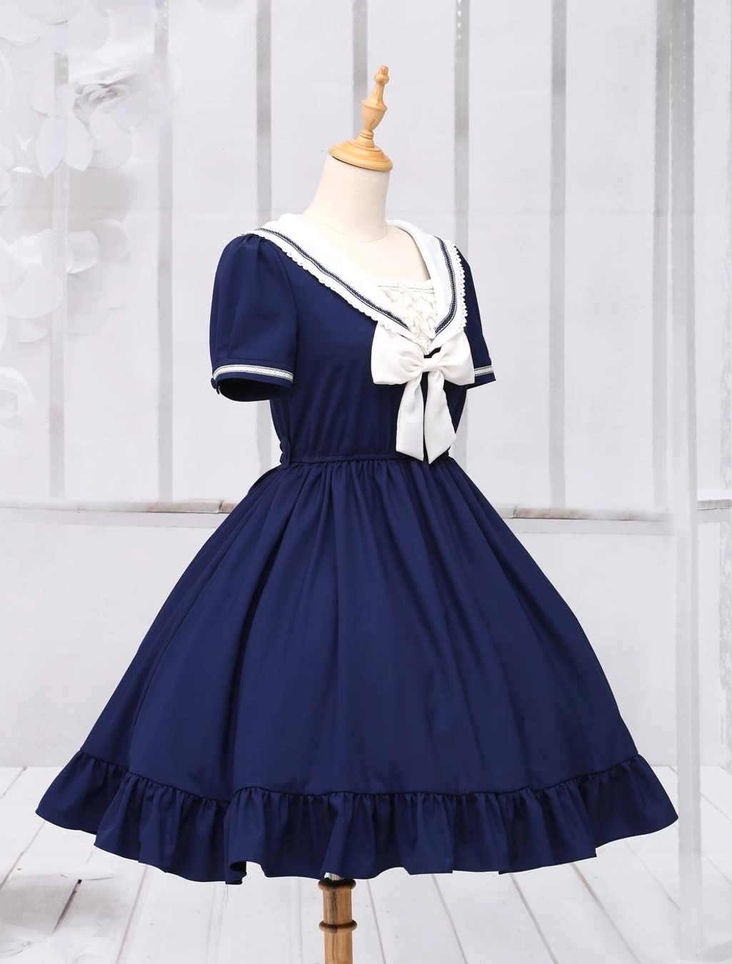 Sweet lolita one-piece dress right-front angle, short sleeves high waist flared skirt with ruffled hem