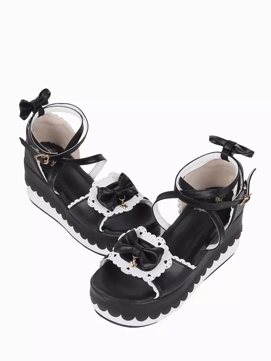 Open-toe Sweet Lolita platform sandal side front oblique angle showing lace-trimmed bow decoration, ankle heel bow, and breathable open toe design