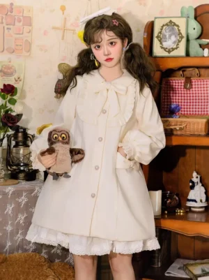 Cream sweet lolita overcoat front full-body view with peter pan collar, fabric bow, and ruffled details on model in vintage home setting