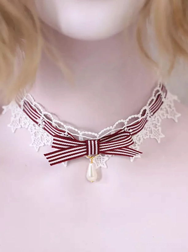 Sweet Lolita lace choker necklace with white star pattern lace, deep red and white striped satin bow, and drop-shaped pearl accent