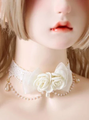 Sweet lolita rose choker front-side view on BJD doll displaying sheer bow with double cream roses and hanging pearl tassel charm detail