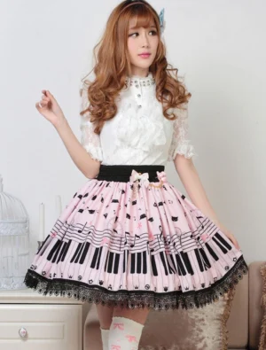 Sweet Lolita piano keys skirt with musical cat print in soft pink, front half-body view on model, showing vibrant print design with piano keys musical notes and adorable cat characters