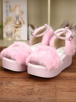 sweet lolita pink platform sandals left front three-quarter angle showing thick wedge sole light pink leather trim and fluffy upper fabric