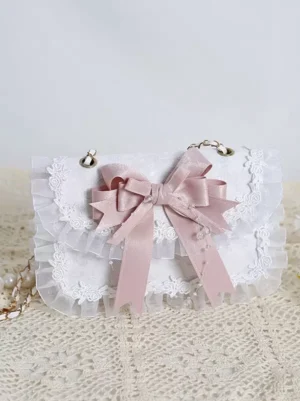 Sweet Lolita pink crossbody handbag front top-down view featuring white polyester base with pink satin bow and ruffled lace trim detail