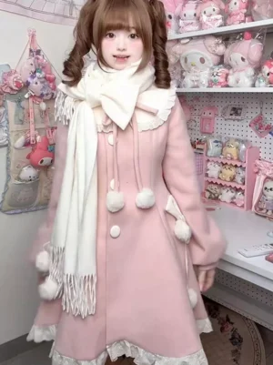Sweet lolita pink overcoat with decorative round front buttons and pom-pom ruffled hem detail showcasing vintage-inspired closure design