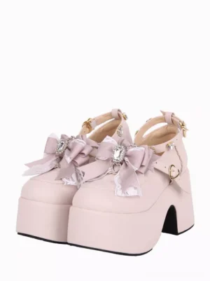 Sweet Lolita pink platform pumps front flat display showing rhinestone-embellished bow and round matte PU toe with ankle buckle strap