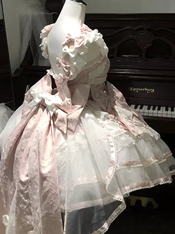 Sweet lolita pink white dress oblique angle ruffled shoulder details lace tulle hem mannequin