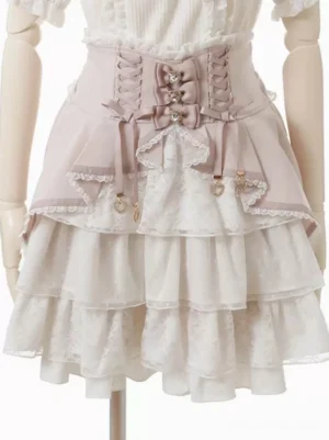 Sweet lolita pink and white two-tone skirt with lace-up corset front and tiered lace design featuring heart pendants full front view on dress form