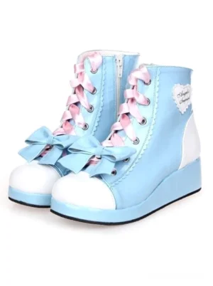 Sweet Lolita platform ankle boots rear three-quarter view light sky blue white bicolor wedge heel pink ribbon laces front blue bow decoration