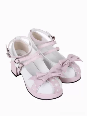 Lolita chunky platform sandals rear angle displaying dual heart-buckle ankle straps and bow embellishment on white background