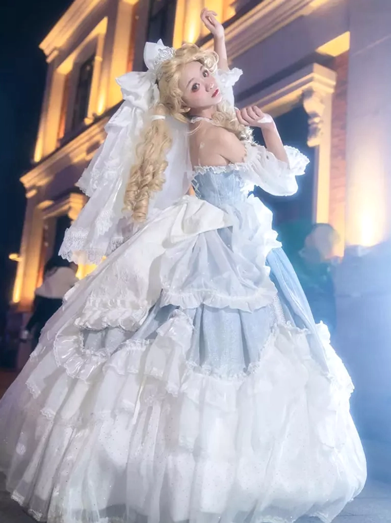 Sweet Lolita princess dress rear view featuring large decorative bow, layered ruffles, elegant back silhouette, and flowing train detail