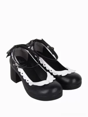 Sweet lolita chunky heel pumps side profile showcasing sculptural angel wing decoration and chunky mid-height block heel with scalloped edge detailing