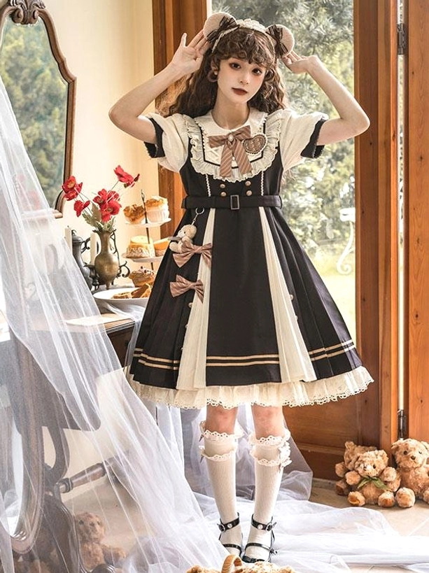 Sweet Lolita dress front full-body shot displaying complete silhouette, white stockings, Mary Jane shoes and full pleated skirt in vintage tea room