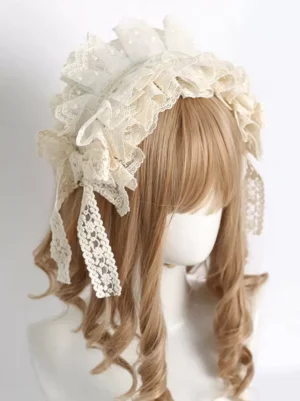 Sweet Lolita lace headdress with white ruffles and decorative bow, featuring multi-layered floral embroidered lace design, front-left side view on display mannequin with curly wig, rococo-inspired hairband accessory