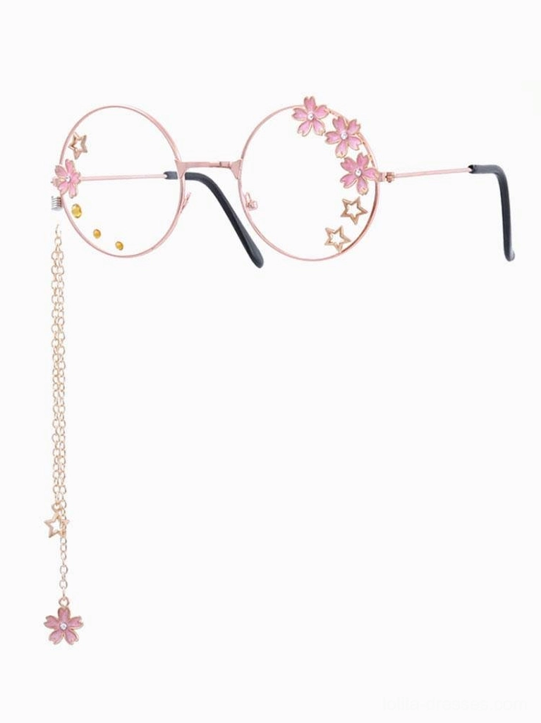 Single sweet lolita decorative round frame glasses with rose gold finish, pink floral and star accents, metal chain with coordinating flower and star pendant charm, left side perspective