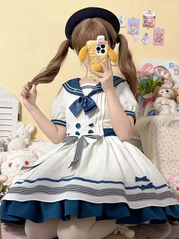 Sweet lolita sailor dress mirror selfie showing waist bow double-breasted buttons puff sleeves classic sailor aesthetic
