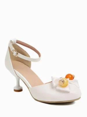 Sweet Lolita round-toe sandals side and rear three-quarter view displaying kitten heel, ankle strap buckle closure, and decorative bow with fruit beads on white background