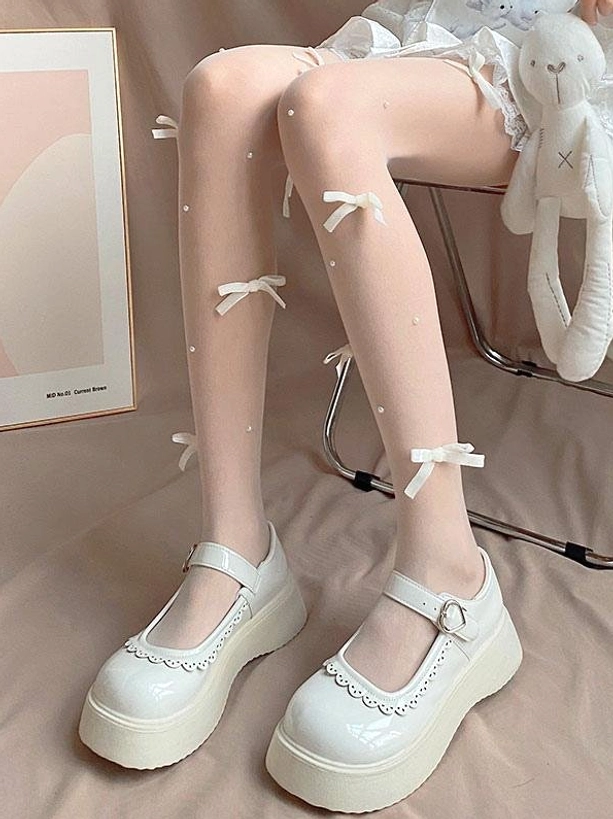Sweet lolita sheer tights front lower leg view off-white satin bows faux pearls sheer nude fabric white lace skirt platform shoes