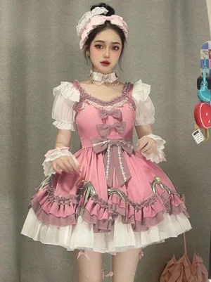 Sweet Lolita short puff sleeve dress front view with layered ruffled skirt, purple trim, green ribbon bows, matching pink lolita accessories