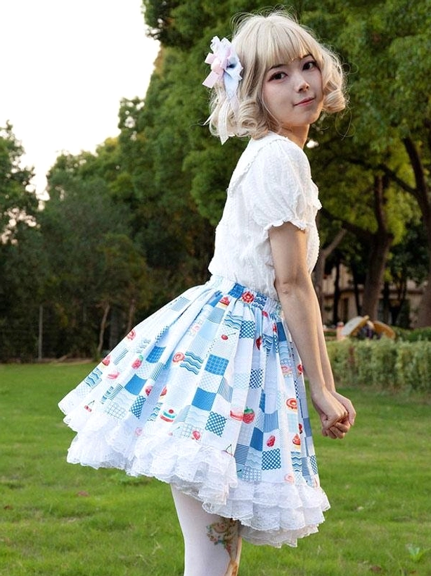 Lolita SK skirt side rear medium shot outdoor grassy park white ruffled hem design floral hair accessory pastoral aesthetic